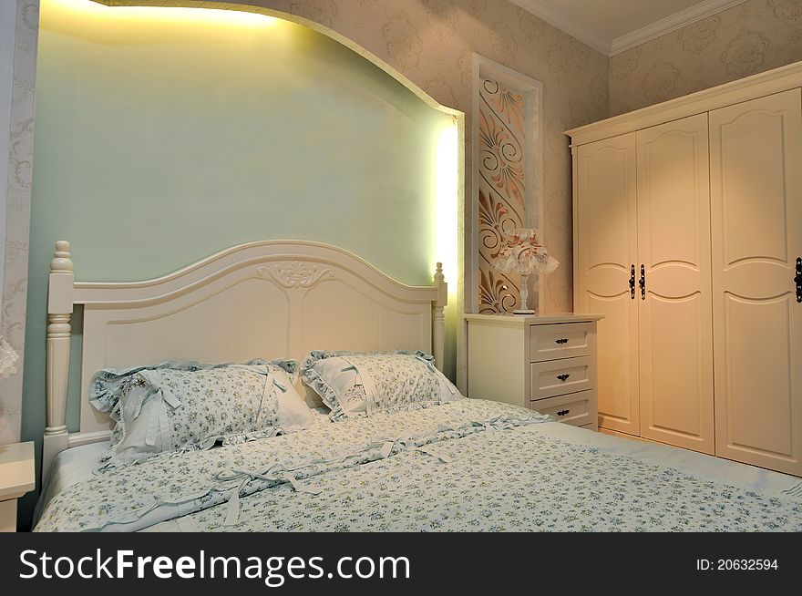 Lighting color bedding room interior, in light pink, blue and cream color, shown as elegance style and comfortable life.