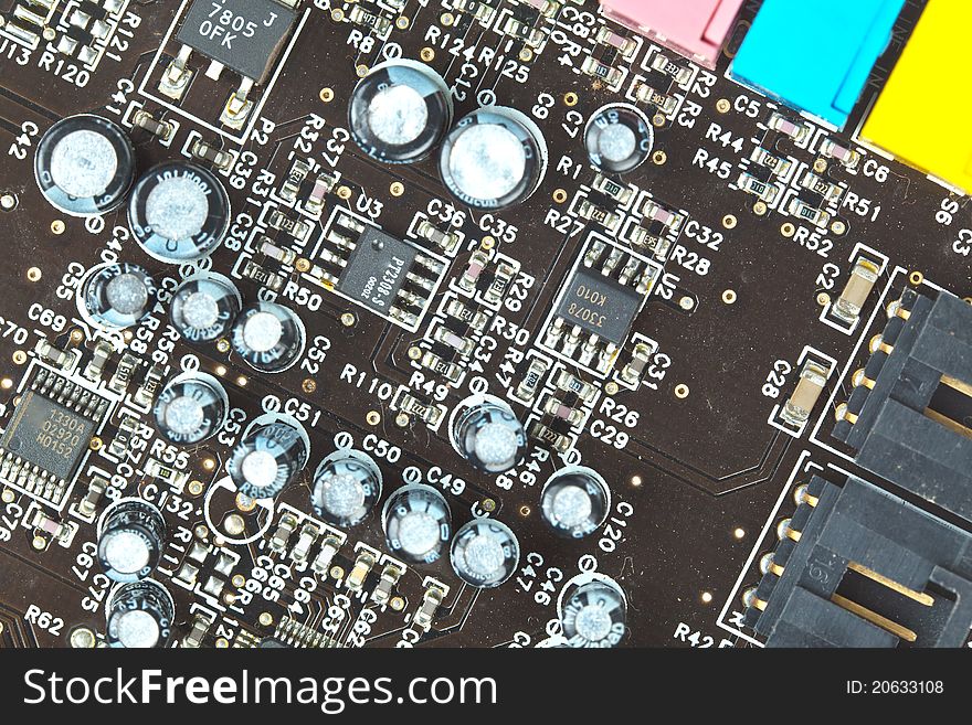 The printed-circuit board with electronic components macro background