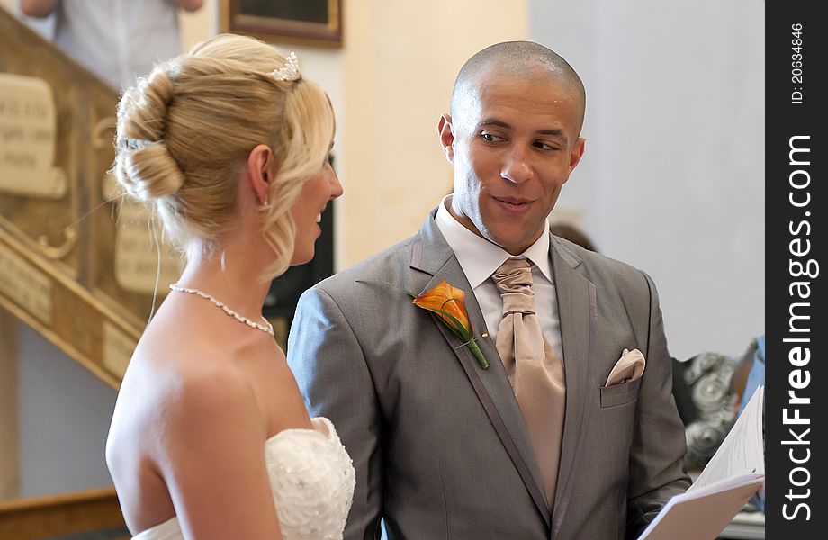 Bride and Groom in church in a Spanish wedding ceremony