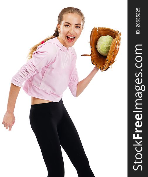Young woman holding a cabbage in baseball glove