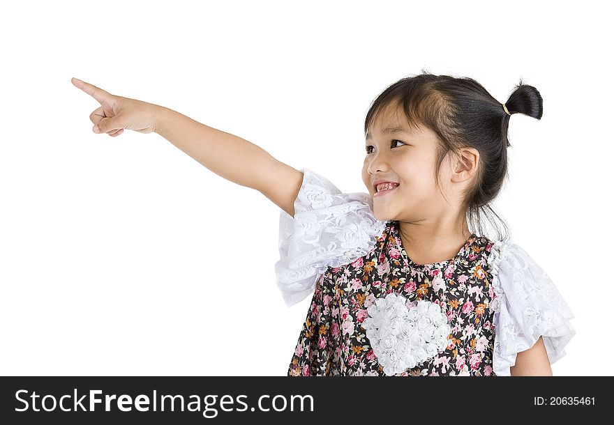 Little girl pointing at something, isolated on white background