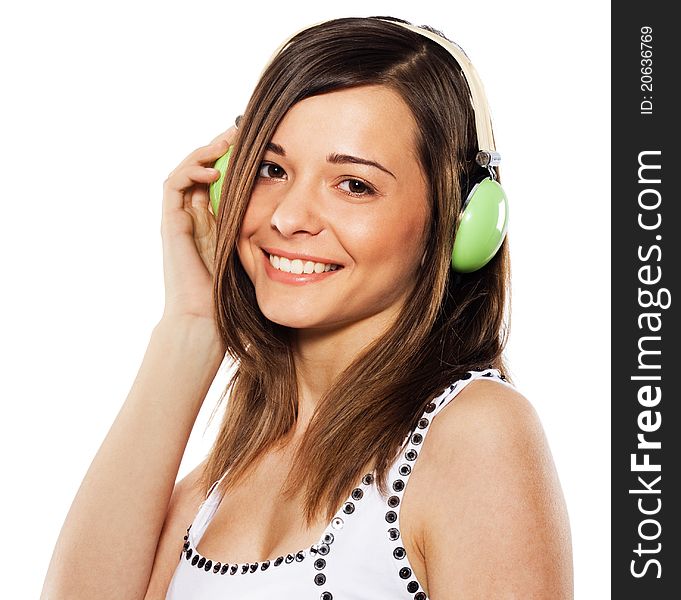 Lovely girl listening a music in headphones