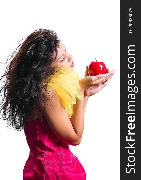 Beautiful brunette woman with red apple in hands i