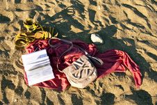Sandals, Book And Pareos On The Sand Stock Photography