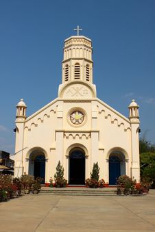Pastel Yellow Church Against Blue Sky In Lao PDR. Stock Photography Pastel Yellow Church Against Blue Sky In Lao PDR. Stock Photography
