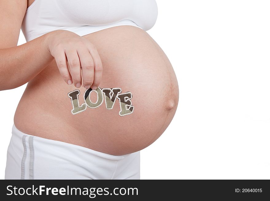 Pregnant woman hold word love on in hands on white background. Pregnant woman hold word love on in hands on white background