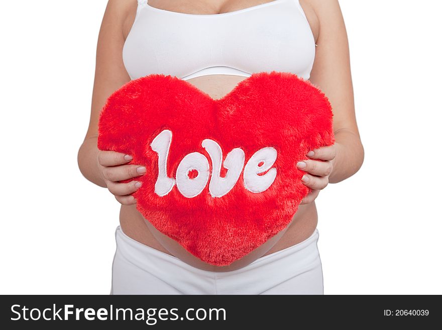 Pregnant woman hold red hart with love in hands on white background