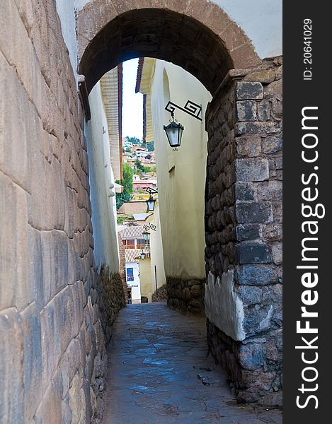 Old narrow street in the center of Cusco Peru