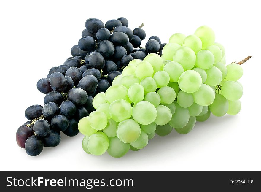 Bunches of black and green grapes isolated on white background