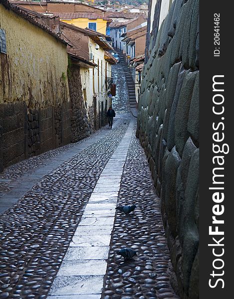 Old narrow street in the center of Cusco Peru