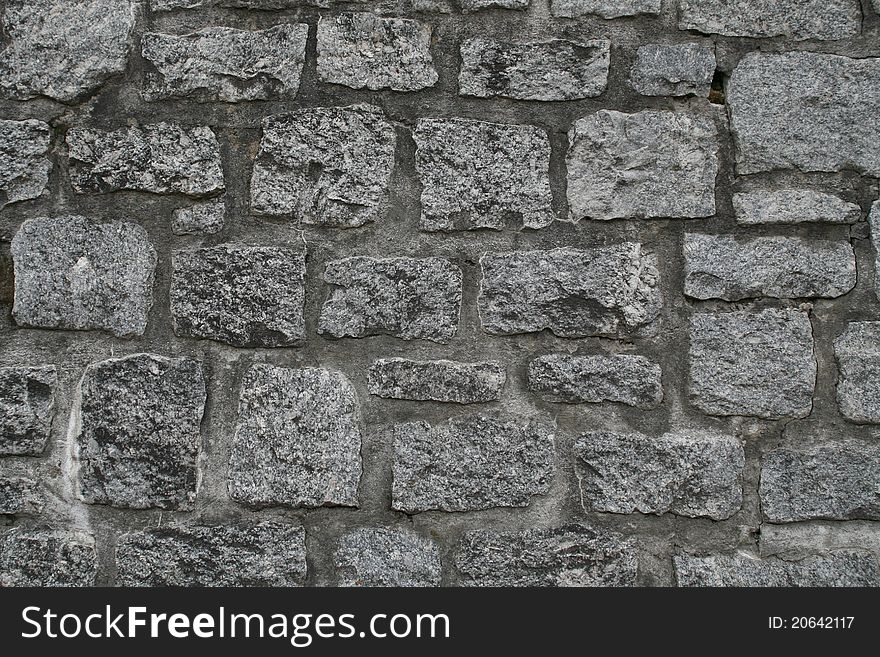 Closeup of stone wall use for construction business and designers (Textures)