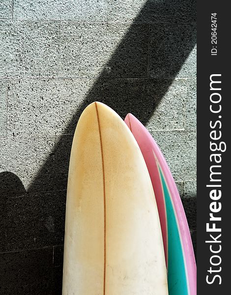 Two surfboard standing on empty wall. Two surfboard standing on empty wall