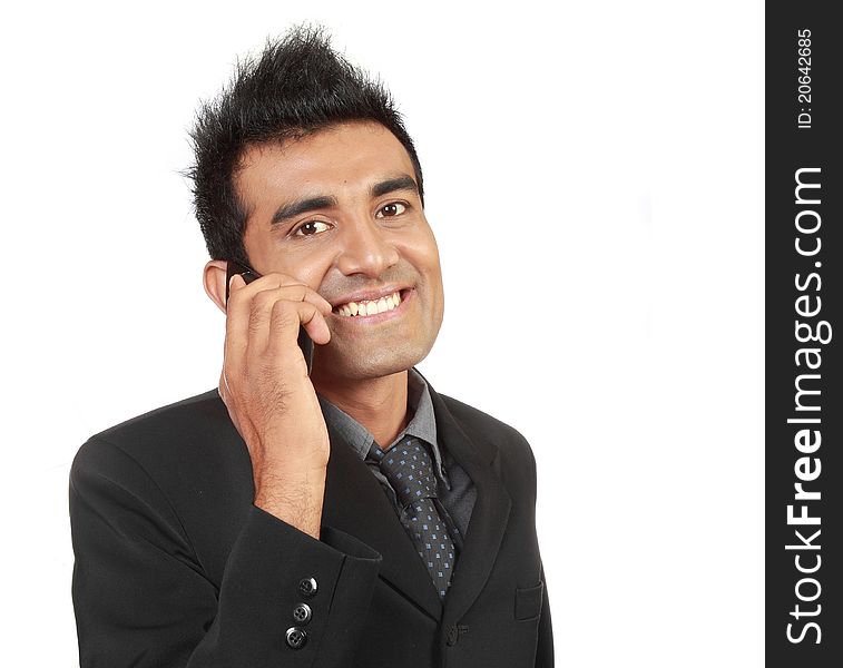 Young arabic businessman talking on the phone