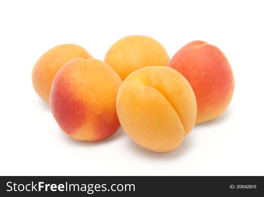 Apricots on a white background. Apricots on a white background