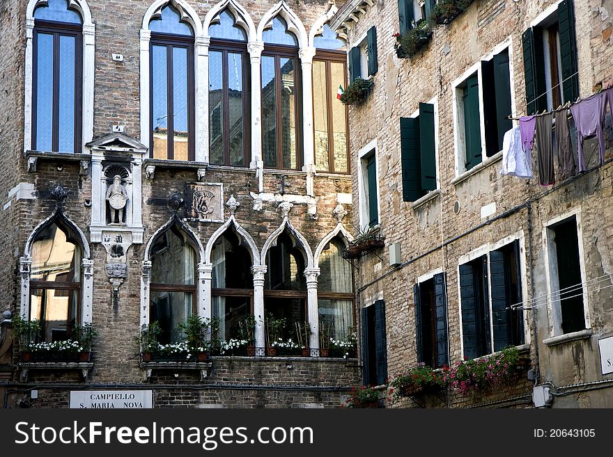 Buildings with traditional Venetian windows in Venice, Italy. Buildings with traditional Venetian windows in Venice, Italy