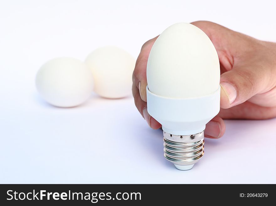 Egg in the base of energy-saving bulb