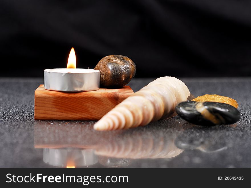 Tea Light Candle With Seashells And Shallow DOF. Tea Light Candle With Seashells And Shallow DOF