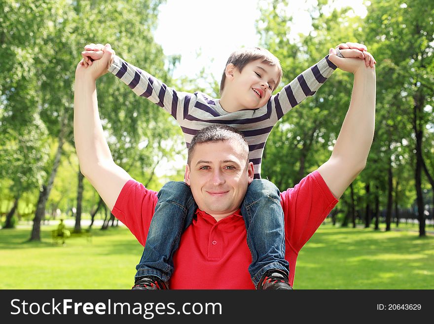 Father With His Son In The Park