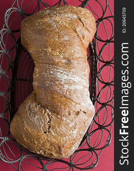 Loaf of italian bread over color background. Loaf of italian bread over color background