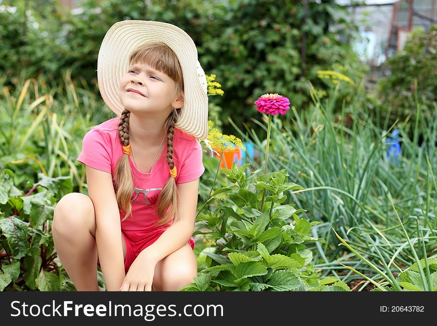 Girl Gardening In The Summer
