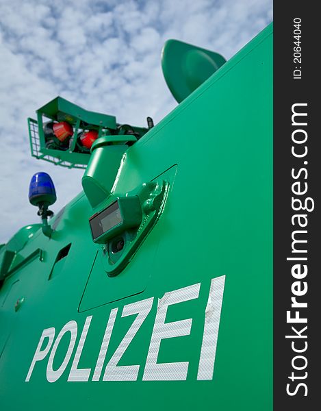 A green german Police vehicle