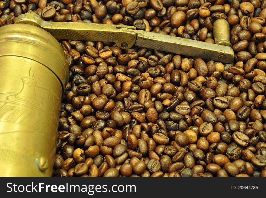 Coffee grinder with fine grains of freshly baked coffee