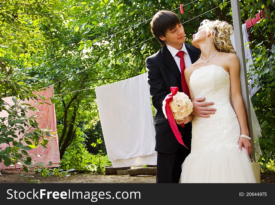 Young and cute bride and groom on their wedding