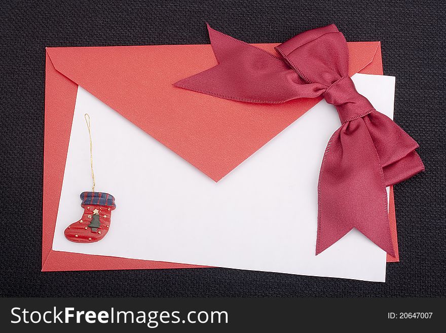 Congratulatory letter with a red envelope and a scarlet ribbon.