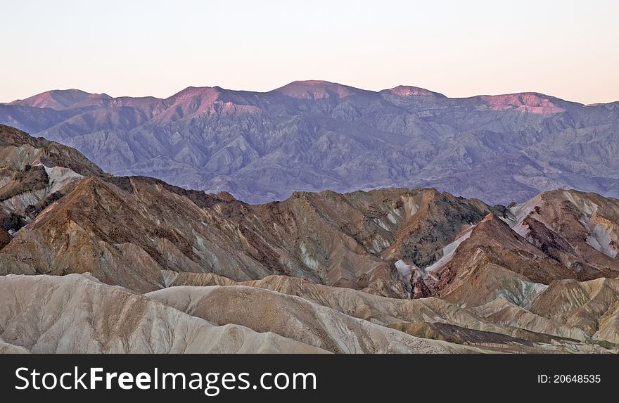 Sun rising over colorful rock formation at zabriskie point,death valley,california,november 2009. Sun rising over colorful rock formation at zabriskie point,death valley,california,november 2009.