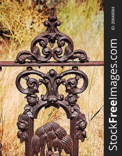 Old rustic ornamental ironworks fence