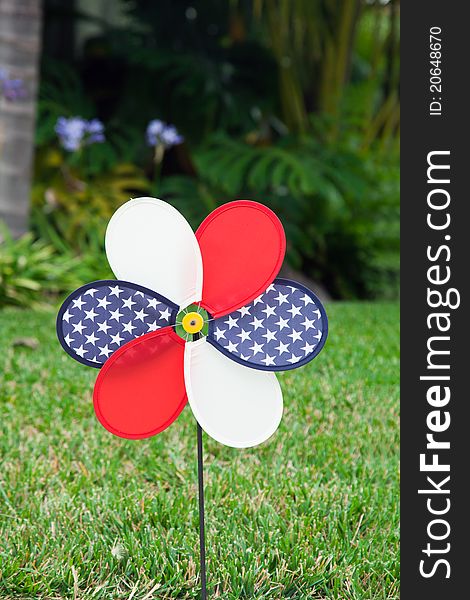 Pinwheel with the U.S. symbol on green grass