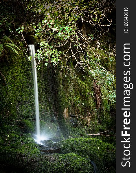 Hidden waterfall in remote location in West Cork, Ireland. Hidden waterfall in remote location in West Cork, Ireland