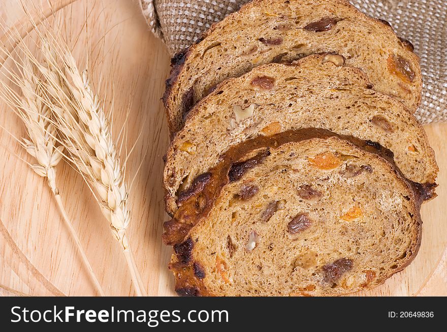 Fresh bread with ear of wheat. background