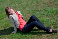 Girl Sitting On The Grass Royalty Free Stock Image Girl Sitting On The Grass Royalty Free Stock Image