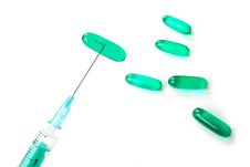 Syringe With Pills, Isolated. Royalty Free Stock Photography Syringe With Pills, Isolated. Royalty Free Stock Photography