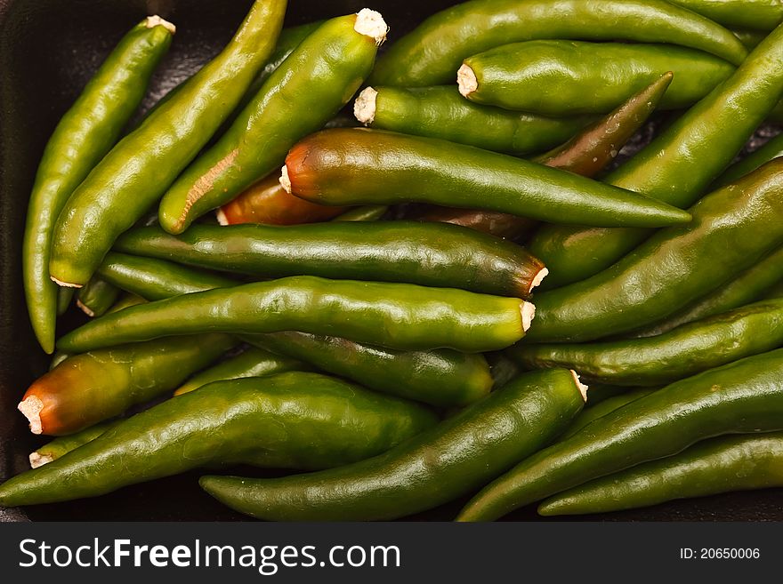 Macro shot of tropical green chilli. Macro shot of tropical green chilli