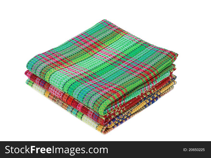 Stack of cotton kitchen towels isolated on white background