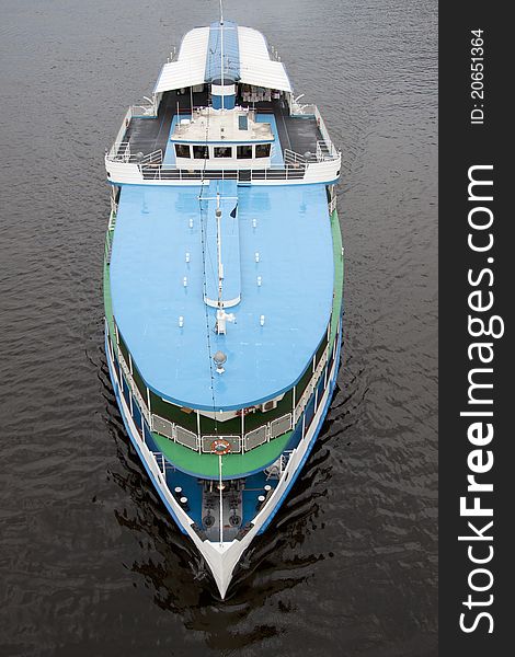 Vintage river cruise vessel on calm water