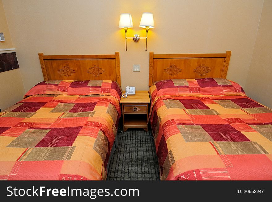 Clean and tidy hotel beds with beautiful lighting. Clean and tidy hotel beds with beautiful lighting.