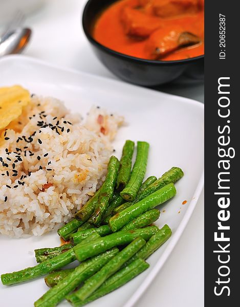 Healthy oriental curry rice set with lightly cooked beans. Healthy oriental curry rice set with lightly cooked beans.
