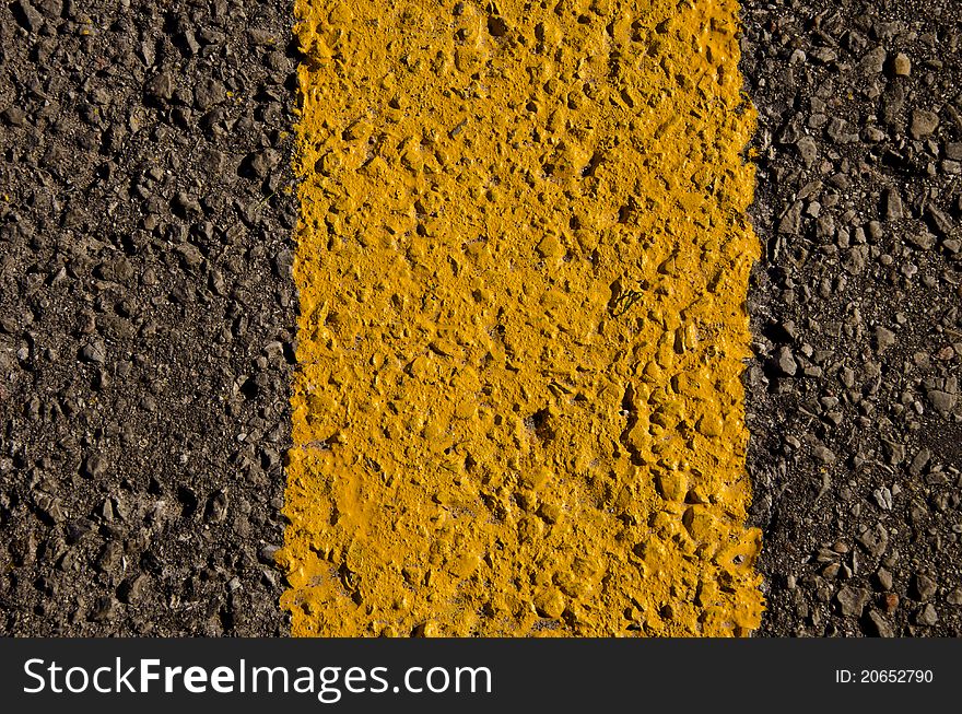 Gray, black and yellow asphalt background and texture
