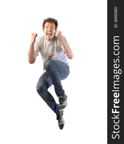 Happy smiling young man jumping. Happy smiling young man jumping