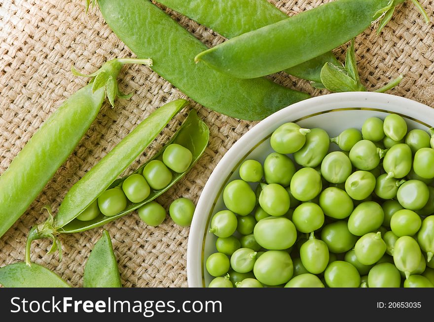 Green pea on sack closeup