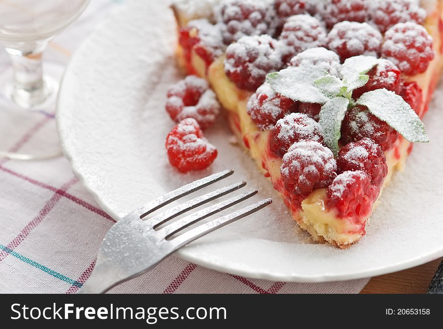 Raspberry cake isolated on white