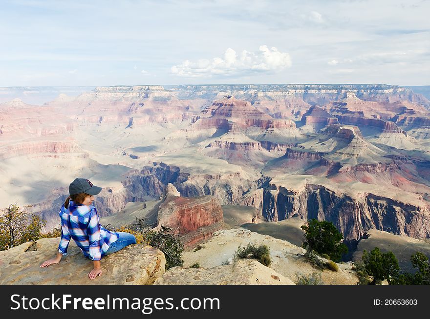 Female hiker takes a break on the Grand Canyon, Arizona