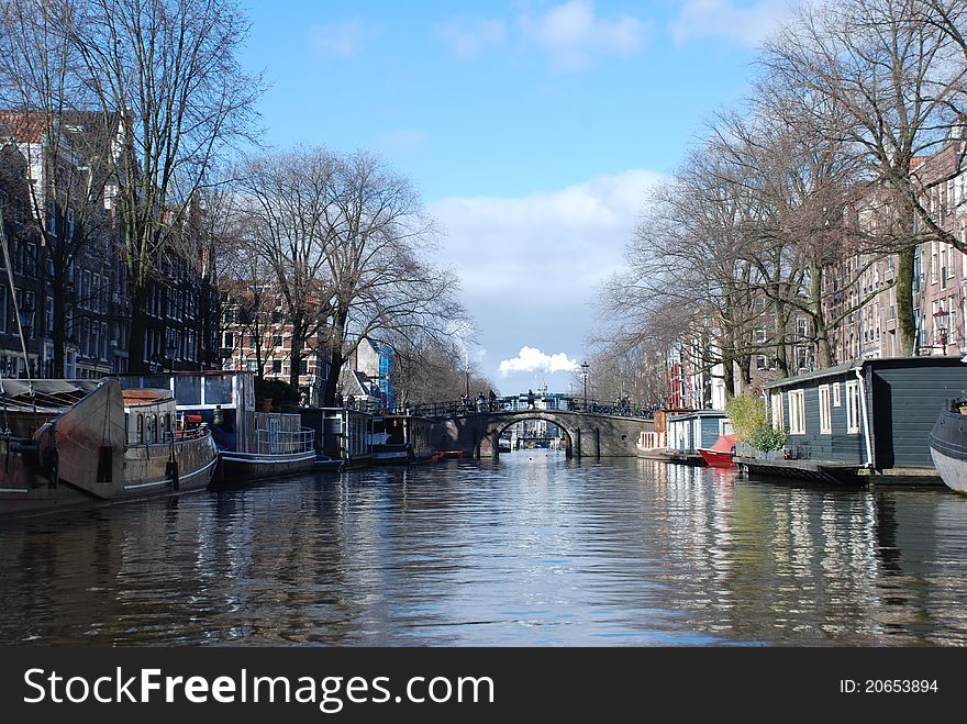 A quiet canal in Amsterdam, at the end of March. A quiet canal in Amsterdam, at the end of March