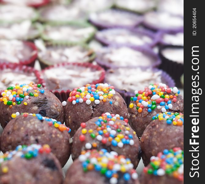 Background filled with colorful cakes and desserts,shallow depth of field