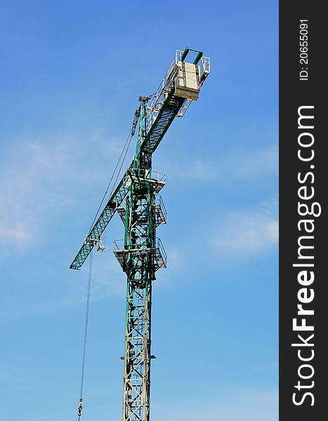 The Green High Crane with Blue Sky
