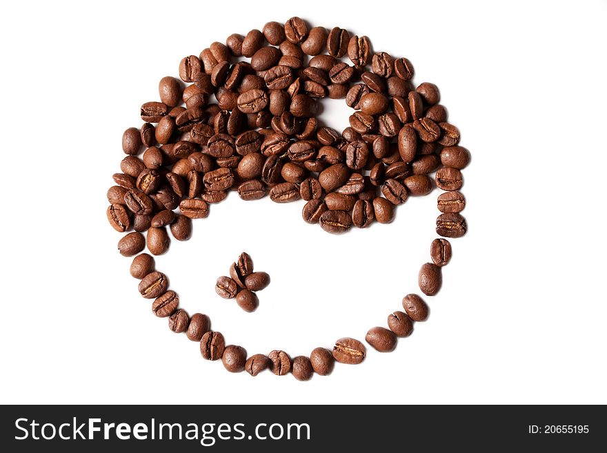 Brown and white symbol made of coffee beans on a white background