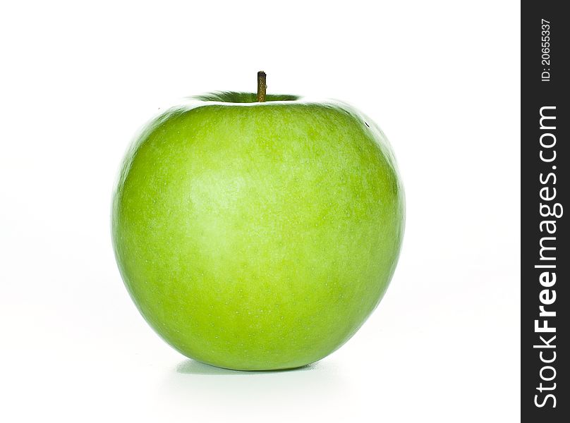 Green delicious apple on isolated white background